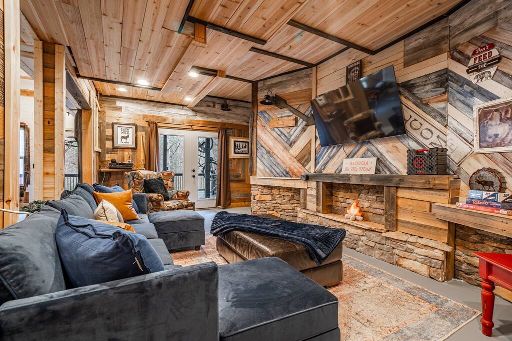 This comfy big sofa rearranges to make a queen size bed and we provide a super lush memory foam mattress to place on top, which ensures the ultimate comfort.  (new fireplace not pictured here, see previous photo)