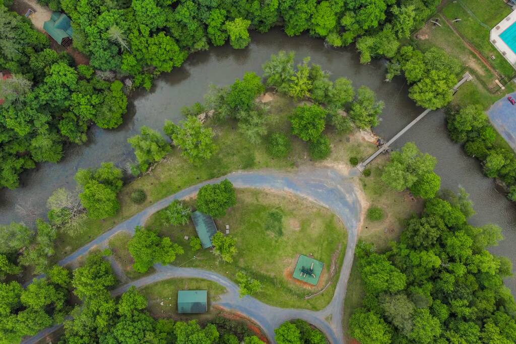 Fish Trap Park and the gorgeous suspension bridge connecting to Riverside Pool. This is the best place to park and put in the river and float back to the cabin. It's a short drive and also the quickest way to Riverside Pool (pool open seasonally).