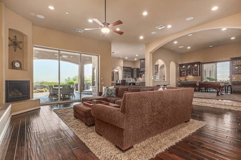 Escape to your luxurious Scottsdale oasis! Enjoy spacious open-plan living, a gourmet kitchen, and an expansive patio with stunning views – perfect for entertaining or relaxing.