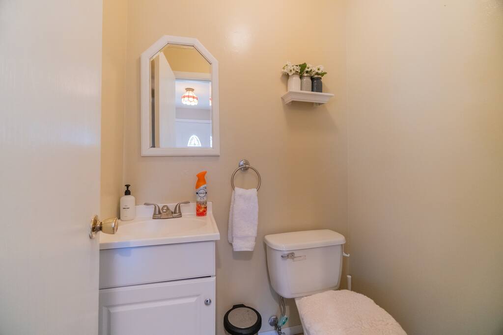 Powder room on the main floor has easy access.
