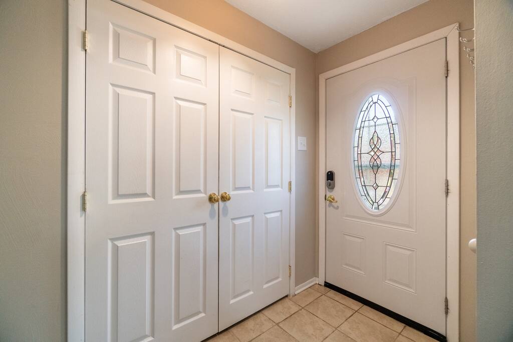 Our storage closet with a lot of storage space right in the entryway.