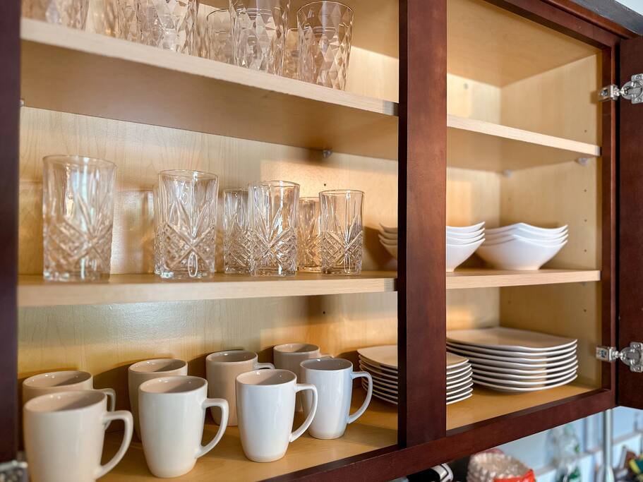 Care for a drink? Coffee mugs and drinking glasses to accommodate. 