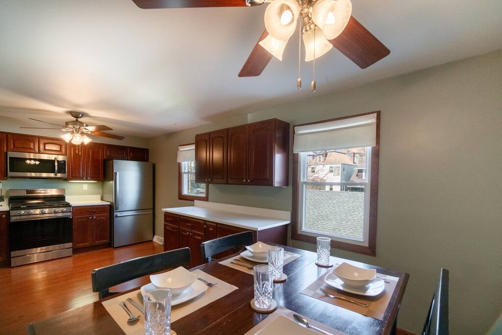 Eat in a sunlit kitchen where you'll be able to watch TV from your seat and have backyard views. 