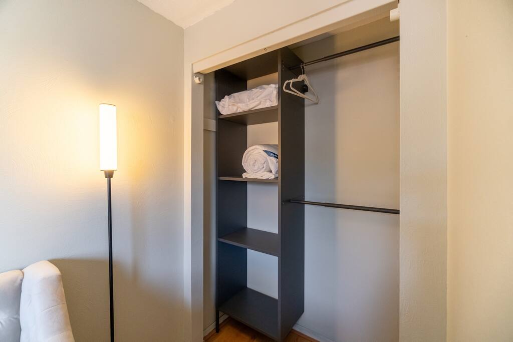 Plenty of storage for your luggage and non slip velvet hangers are available for your stay.