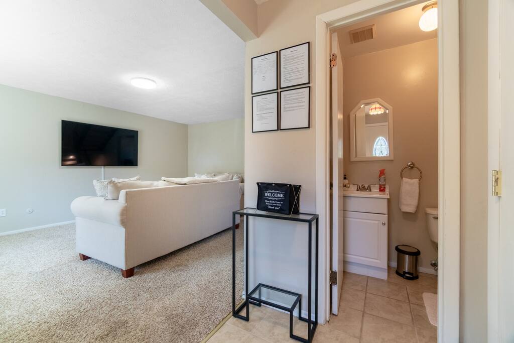 Quick access to the living room and powder room from the front entrance.