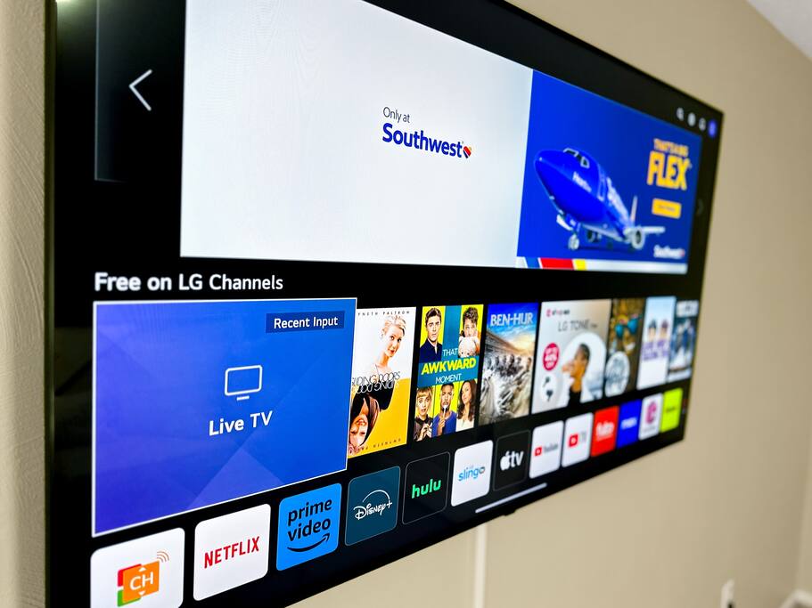 Enjoy Netflix, Amazon Prime, and others on our 65" screen TV. Sit back, relax, and unwind on our comfortable sofa and love seat. 