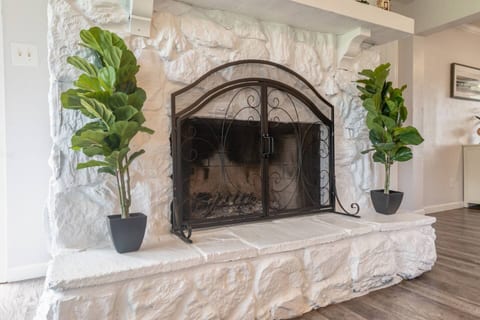 Large fireplace ready for a warm cozy fire