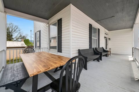 Peaceful outdoor area with cozy seating and lush surroundings — perfect for morning coffee, evening wine, or simply soaking in the fresh air.
