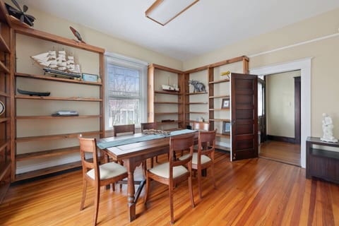 Charming dining space with seating for six — perfect for family meals, game nights, or sharing laughs over dinner.