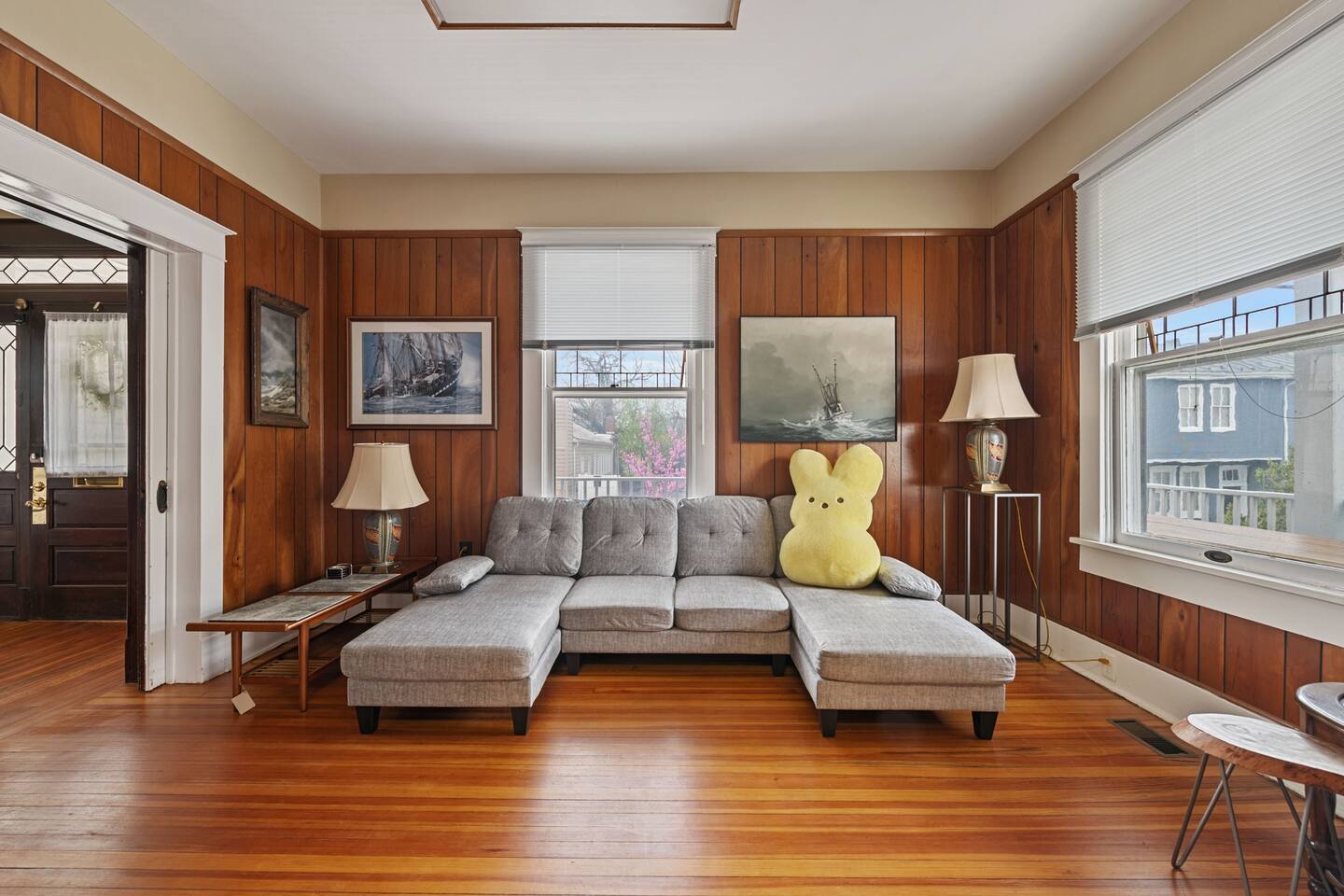 Inviting living room with plush seating, warm lighting, and cozy decor — a perfect place to unwind and feel at home.