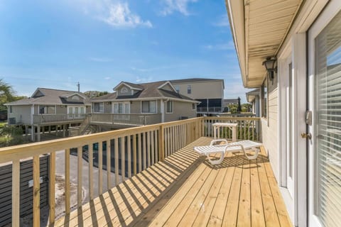 Imagine enjoying your morning coffee or unwinding on this sunny private deck. Relax on the lounge chair and feel the cool ocean breeze.