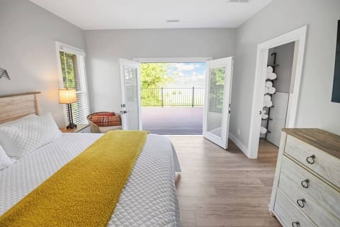 Cozy bedroom with soft lighting, elegant décor, and inviting comfort for restful nights.