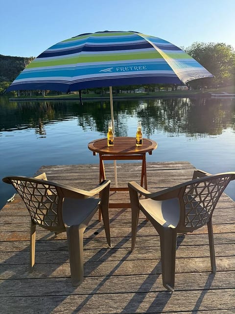 Sit back and relax on your private dock with a drink for two, surrounded by the tranquil lake and stunning views. Perfect for unwinding after a day of adventure.