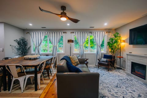 You’ll enjoy gathering here with plenty of cozy seating, warm lighting, and views right out the windows.