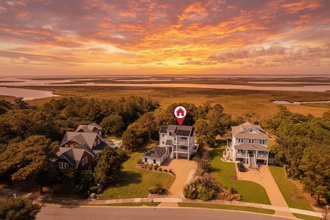 Fall in love with the Currituck Club Grand in Corolla, where golden hour steals the show.