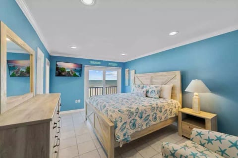PRIMARY BEDROOM WITH OCEAN FRONT BALCONY