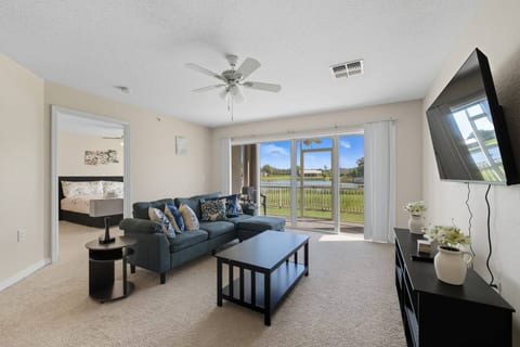 Spacious 2BR Condo Near Disney with Pool & Basketball