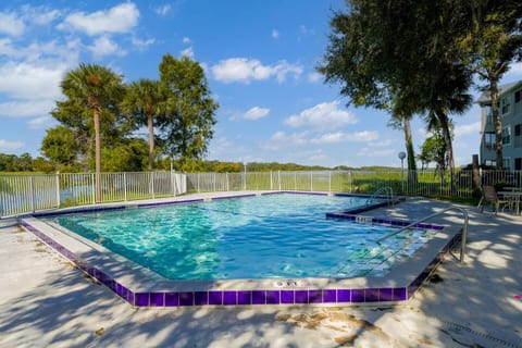 Spacious 2BR Condo Near Disney with Pool & Basketball