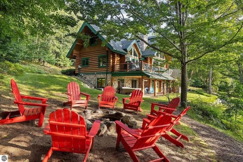 Gather around the firepit under a canopy of trees with cozy Adirondack chairs and tranquil forest views. The perfect spot for s’mores, stargazing, and quality time with family and friends.