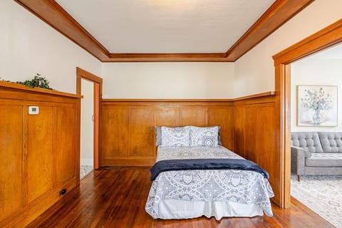 Comfortable Double Bed in open room. Has built in drawers for storage