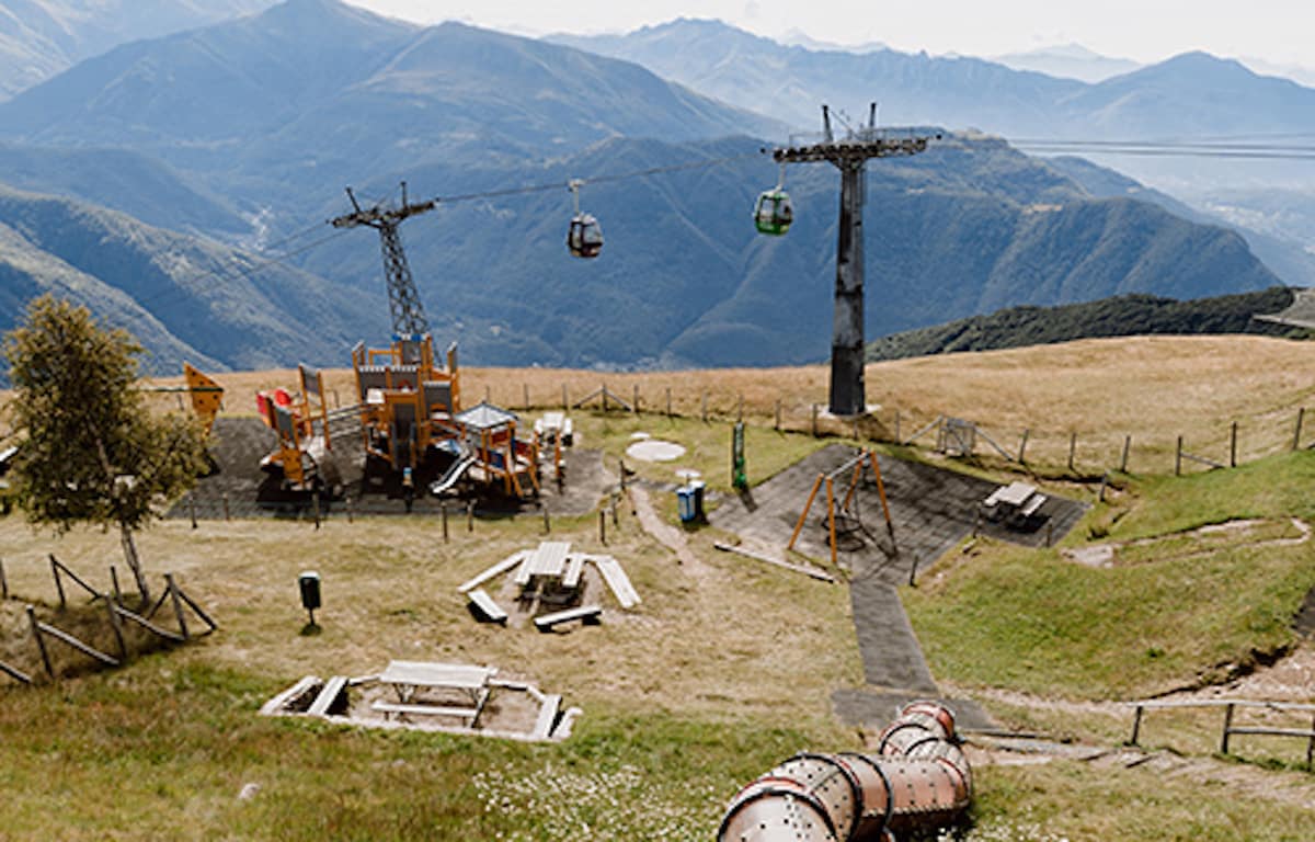 The Tamaro cable cars offer convenient and panoramic transport to the peaks, providing spectacular views of Lake Lugano and the surrounding mountains. Monte Tamaro Playground Alpe Foppa