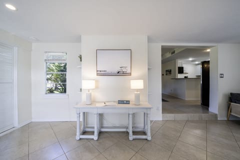 Entryway: Bright and inviting space featuring stylish decor and warm lighting to greet you!
