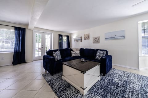 Living Room: Relax on plush seating and enjoy beachy decor in this bright, inviting space!