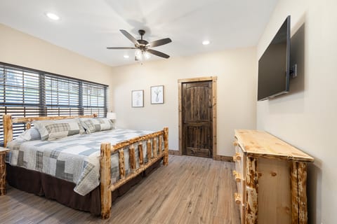 Main Floor Bedroom King Size Beds and Smart TV's in Each Room