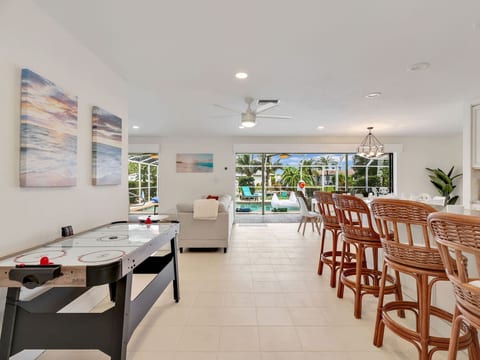 View as you walk into the main living area of the home including eat at counter