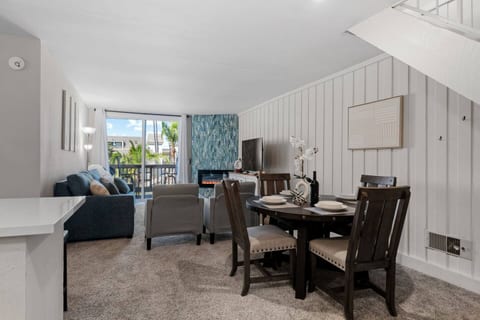Open-concept dining area flows beautifully into the kitchen and living room for easy conversation.