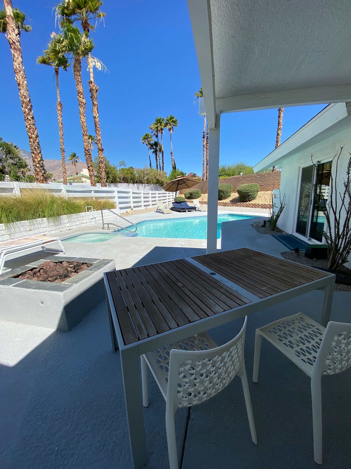 Private heated pool and spa with mountain view