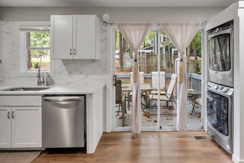 Cook and gather with ease in the fully equipped kitchen, complete with pots, pans, utensils, dishes. while kid-friendly plates, cups, and a high chair make family meals simple. Step outside to enjoy the outdoor grill, perfect for barbecues