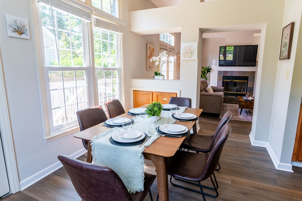 This charming dining space is perfect for gatherings with family or friends. The elegant  dining table comfortably seats six guests, offering ample space for meals, games, or shared moments