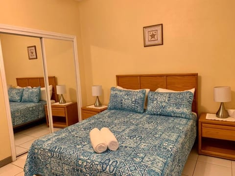Bedroom - private. Queen bed. Executive Desk & Desk chair.