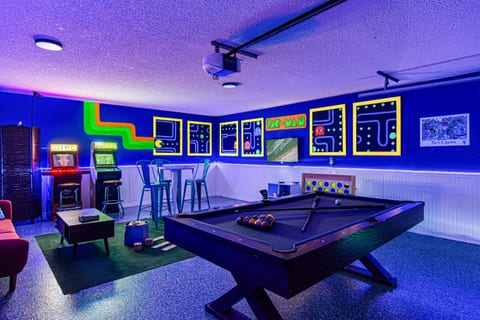 Glow in the Dark game room w/ NBA Allstars and Golden Tee Arcade games, pool table, karaoke machine, Roku tv and many more games!