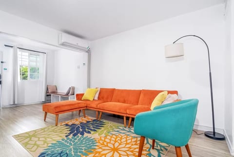 A step-free, fully furnished living room is located on the ground floor of the property.