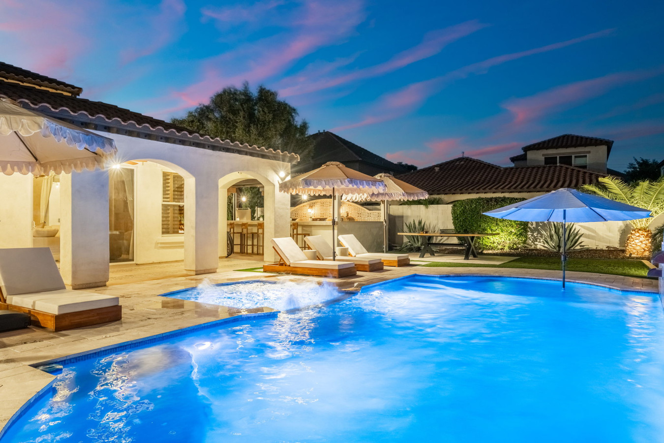 Tranquil poolside scene at night, perfect for quiet moments & late swims