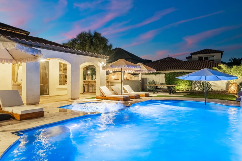 Tranquil poolside scene at night, perfect for quiet moments & late swims