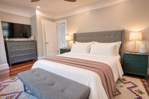 King bed #1, 55" TV, ceiling fan -- "And the beds were absolutely the most comfortable ever! So relaxing after a day of sightseeing!" Myra M. 11/2025