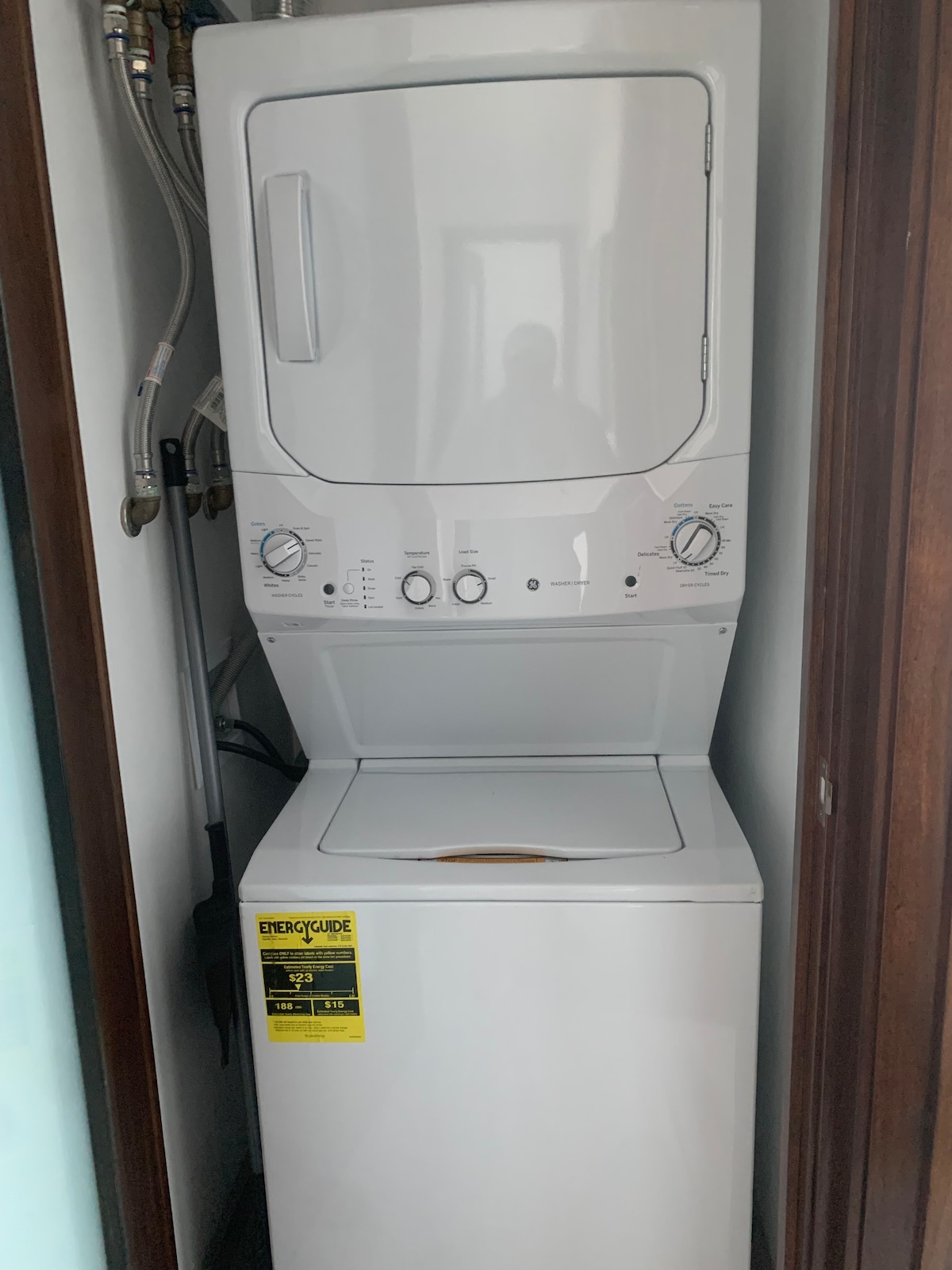 Washer an dryer in the laundry room inside the apartment.