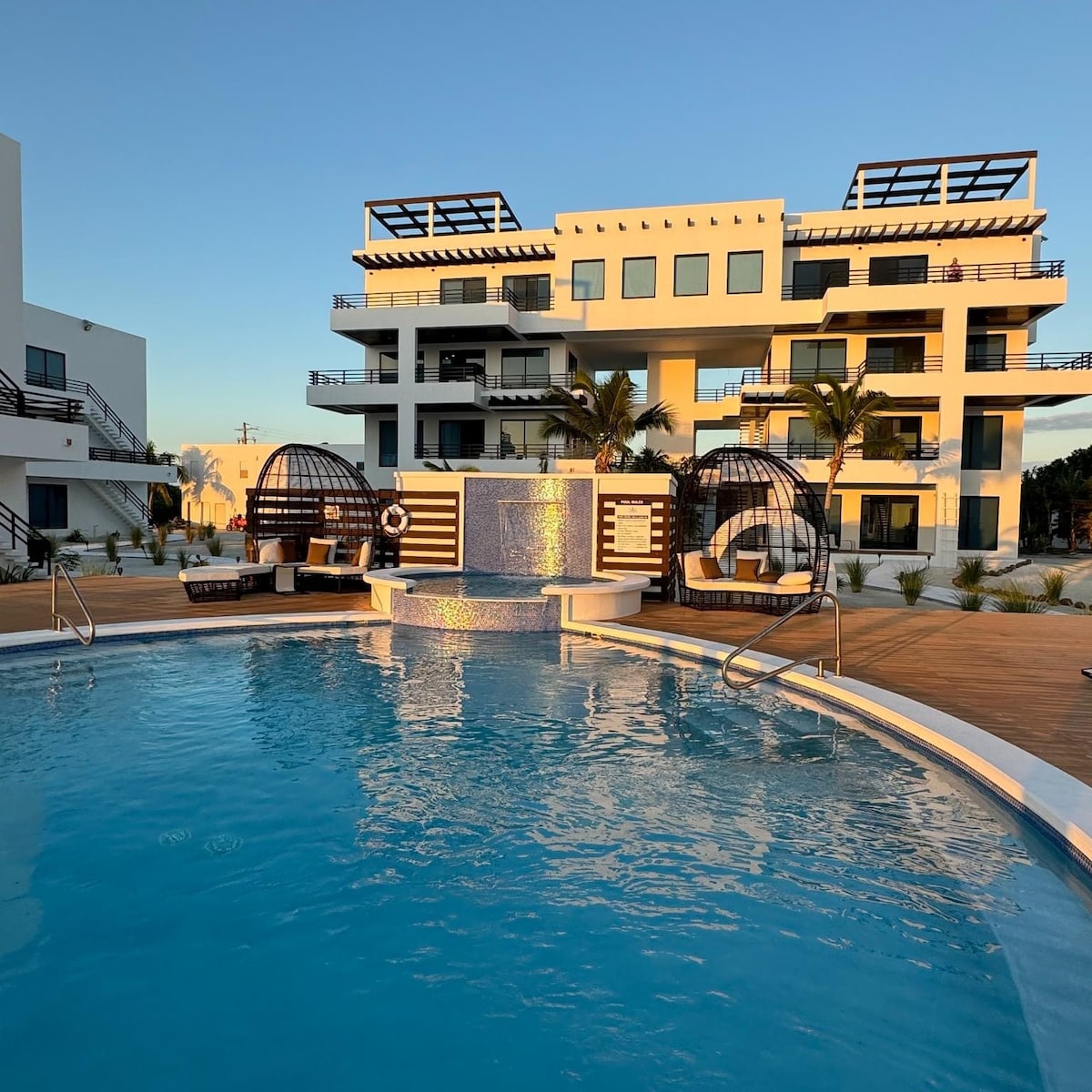 Phase III the building we are located  is to the right  of the pool  