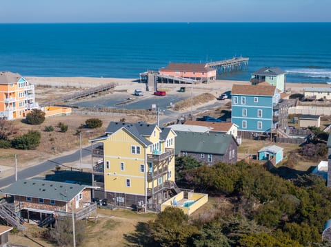 Atlantic Dreams is 200 steps from the famous Hatteras Island Rodanthe Pier, beautiful beach, and crashing waves of the Atlantic Ocean. Visit the pier anytime with complimentary passes for the family, take a stroll or go fishing well into the night.
