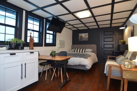 Tiny home was designed from scratch to fit queen-sized bed so you can be comfortable. Large Smart-TV mounted out of the way on ceiling!
