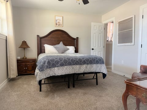 Master bedroom with queen bed. 