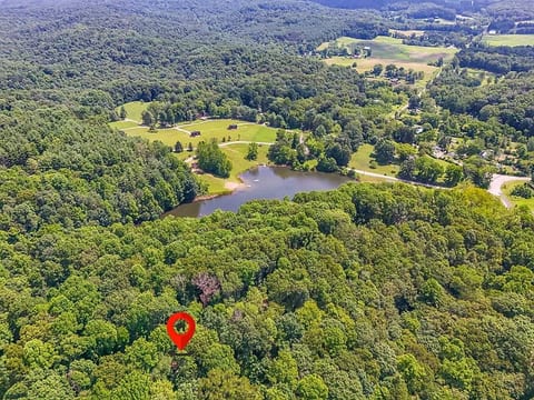 You will not be directly on the lake. You will have to pack a car and drive down to it. It is at the entrance to the community.