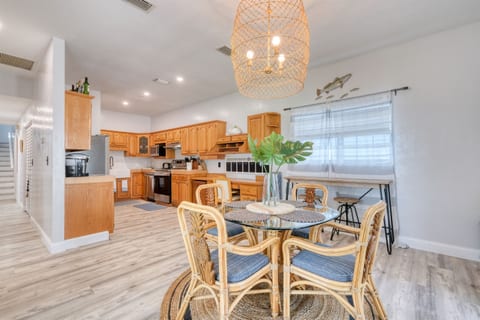 The dining area and kitchen share the open floor plan as you enter.