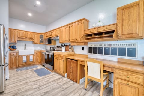 The spacious, bright kitchen is fully stocked for your gourmet meal preparation!