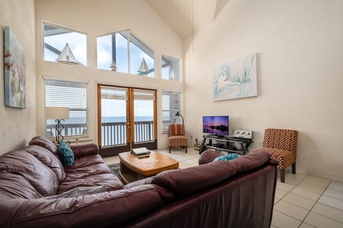 Living Room with Beautiful Cathedral Ceilings!