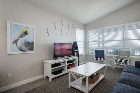 Bright and open living room that greets you with stunning Gulf views!