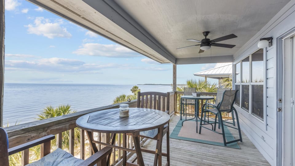 Spacious Balcony with Outdoor Seating and Stunning Views